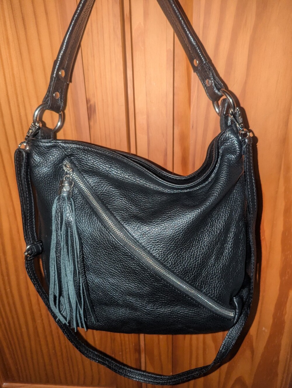 Black Pebbled Leather Shoulder Bag with Tassel Accent.Made In Italy